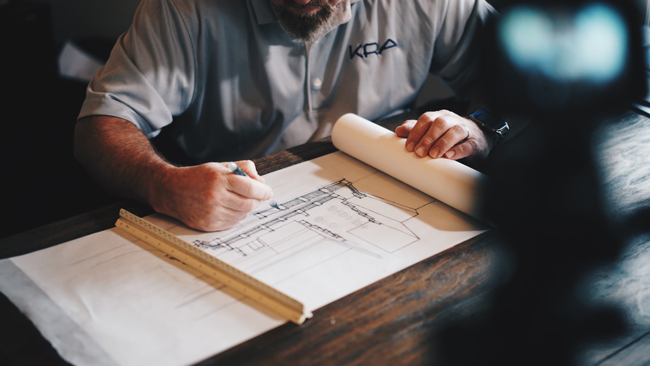Close-up of drafting and material selection